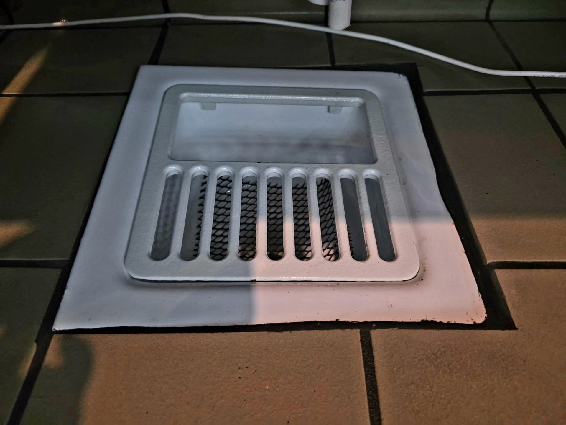 Same kitchen floor drain spotless and sanitized after deep cleaning